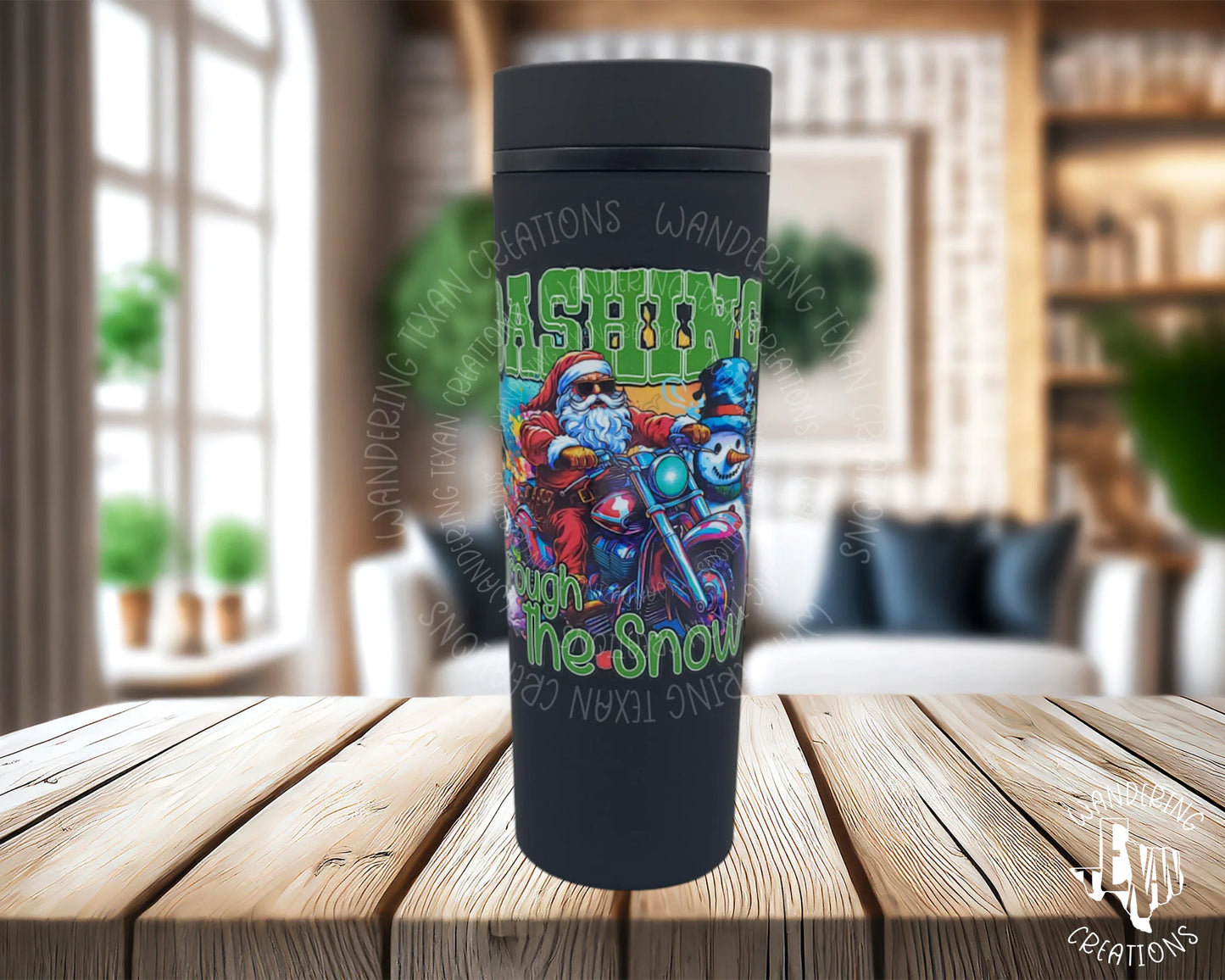 This Motorcycle Riding Santa Tumbler is designed with a die hard Santa on the front, and features a unique Christmas scene design.