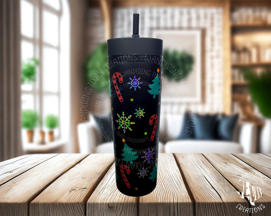 This tumbler is guaranteed to bring holiday cheer all season long! The festive design features snowflakes, Christmas trees, and candy canes—a perfect way to spread the joy of the holidays.