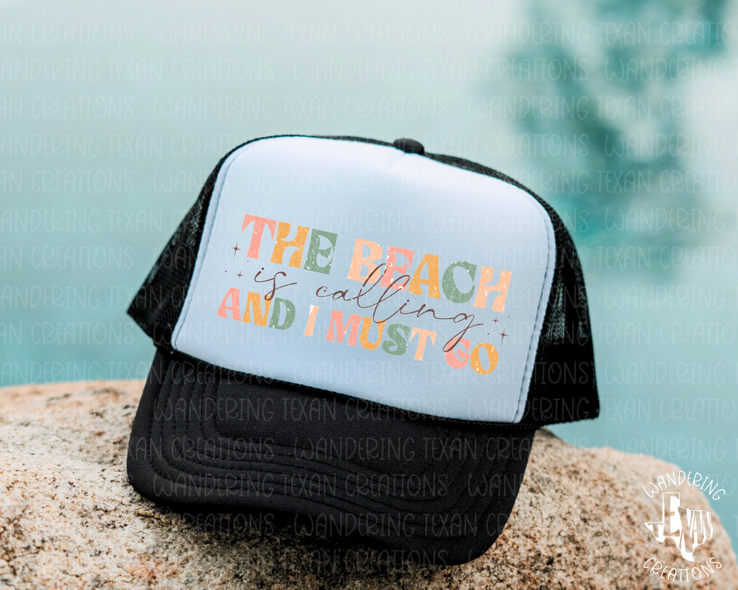 Featuring a vibrant sublimation design and the playful phrase "The beach is calling and I must go", this hat will keep you cool and stylish all summer.