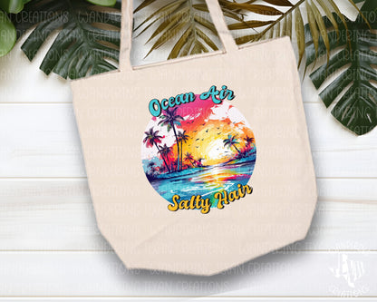 This tote bag features a vibrant sublimation design of a neon beach and ocean scene, complete with the playful phrase "Ocean Air, Salty Hair".