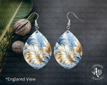 These unique earrings feature a stunning sublimation design of blue and gold leaves that will catch the eye and add a touch of fun to any outfit.