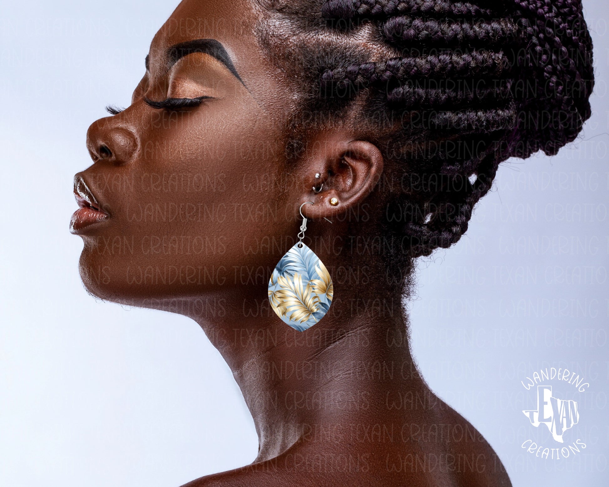 These unique earrings feature a stunning sublimation design of blue and gold leaves that will catch the eye and add a touch of fun to any outfit.