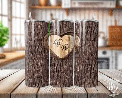 Make your love a bold adventure with our Lovers Initials Monogram Tumbler! This unique tumbler resembles a tree trunk with a heart carved out for you and your partner's initials. 