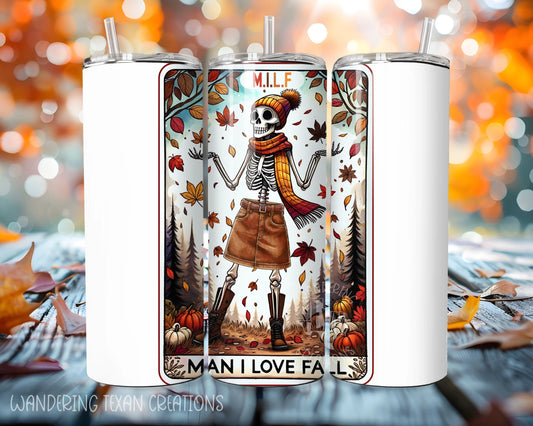 This 30 oz stainless steel double wall tumbler features a unique sublimated design of a tarot card with the title "MILF" and the phrase "Man I Love Fall". Complete with a skeleton in fall attire, this tumbler is perfect for your seasonal sipping needs.