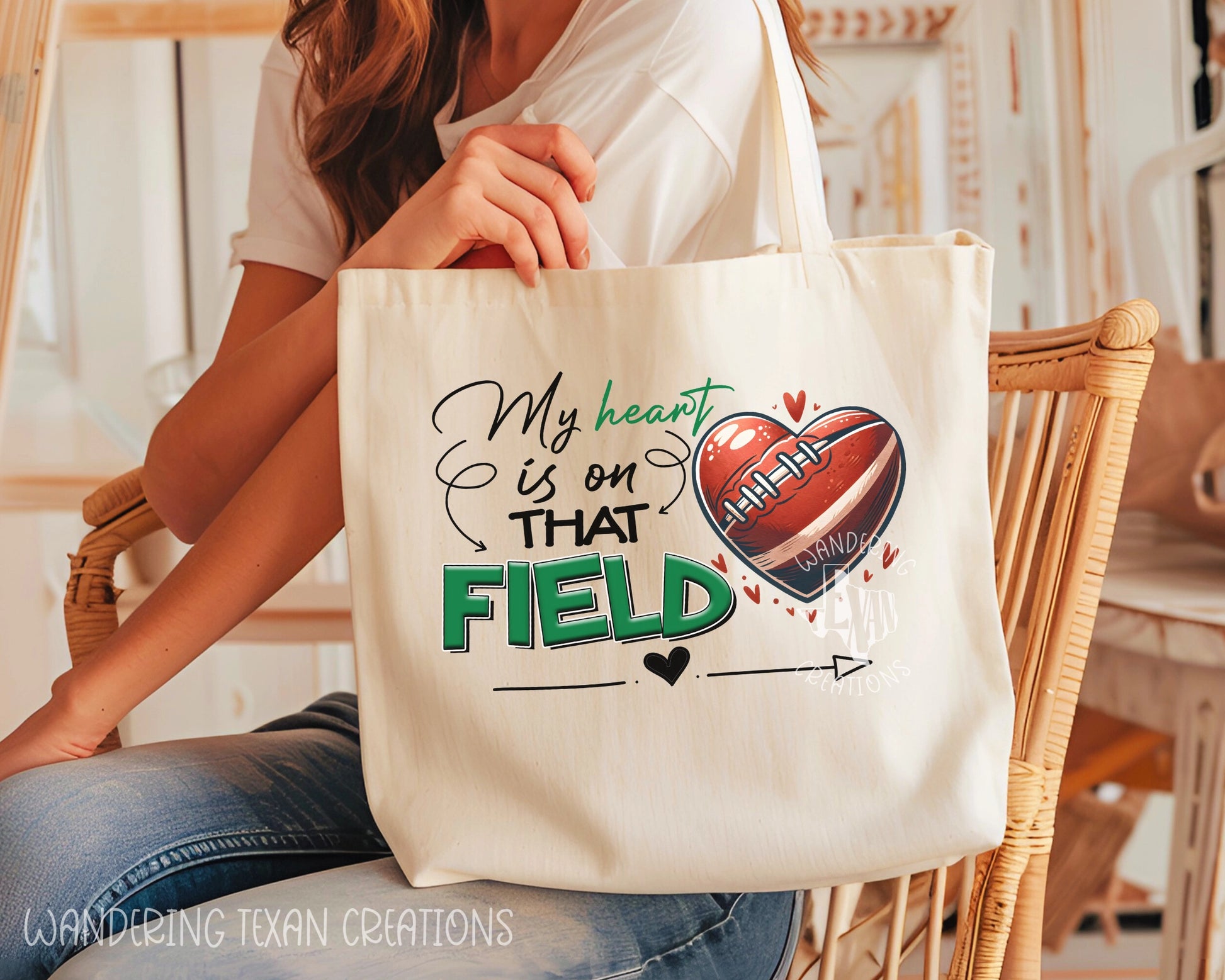 Made from durable canvas, this bag features a heart-shaped football design and the phrase "My heart is on that field" (get it?).