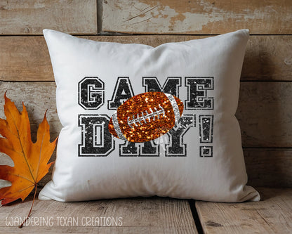 Featuring a bold "Game Day!" design with a football, this pillow cover adds a touch of dazzle to your living space.