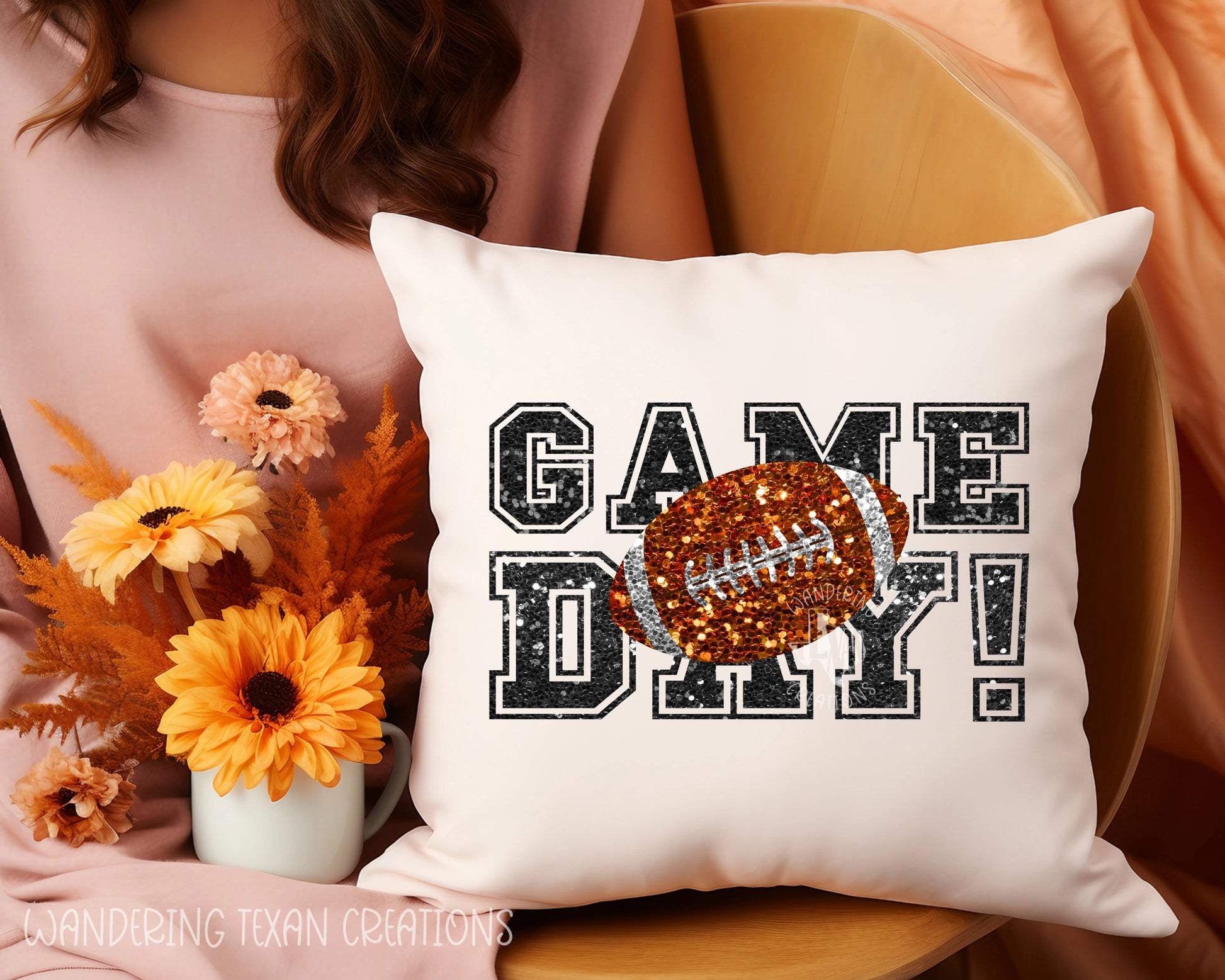 Featuring a bold "Game Day!" design with a football, this pillow cover adds a touch of dazzle to your living space.