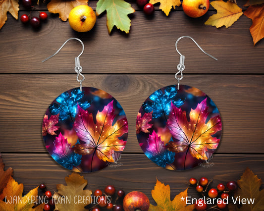  The round-shaped design features a vibrant sublimated print of yellow, purple, and blue leaves, adding a touch of seasonal charm. 