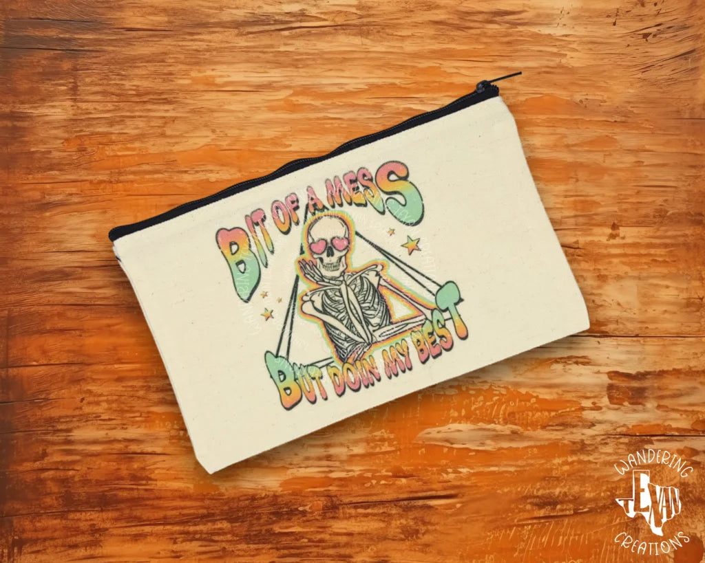 This Bit of a Mess Zipper Pouch is the perfect for those who want to show off their funny motto with style.