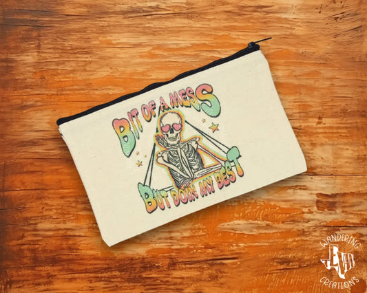 This Bit of a Mess Zipper Pouch is the perfect for those who want to show off their funny motto with style.