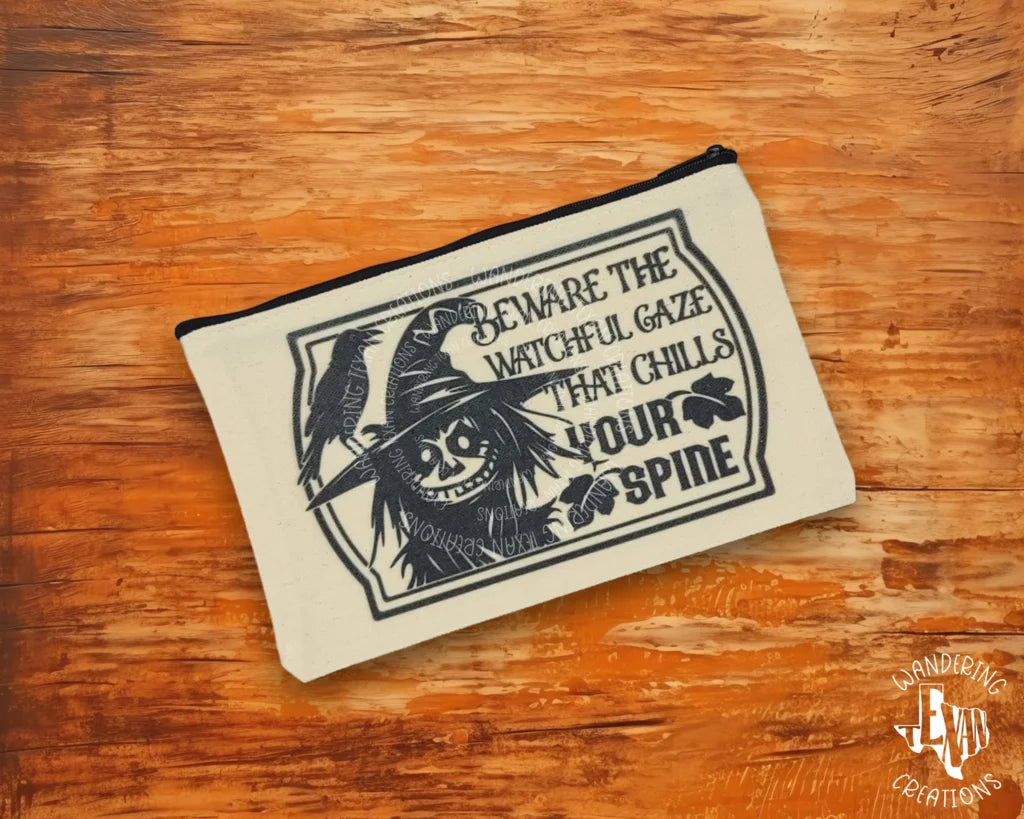 Stay spooky this Halloween with a Scarecrow Chills Zipper Pouch. 