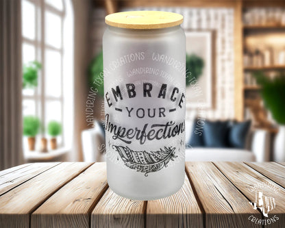 This frosted glass can features a colorful boho skull and flowers with the phrase "Embrace Your Imperfections".