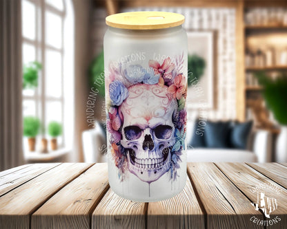 This frosted glass can features a colorful boho skull and flowers with the phrase "Embrace Your Imperfections".