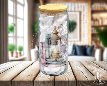 This tumbler features colorful books a.