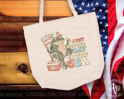  Featuring a fun design of a bullfrog enjoying a relaxing day with an American flag, beer, and cooler, this bag is a festive and practical accessory. 