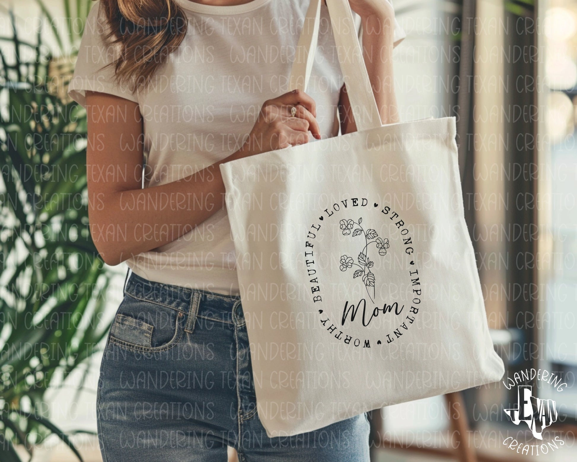 Celebrate mom with our Mom Tote Bag! Featuring a simple yet elegant design, this bag is perfect for Mother's Day. The line-drawn flowers and heartfelt words such as "beautiful", "loved", and "strong" make this tote both stylish and meaningful.