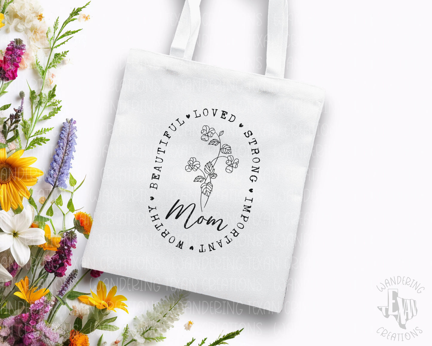 Celebrate mom with our Mom Tote Bag! Featuring a simple yet elegant design, this bag is perfect for Mother's Day. The line-drawn flowers and heartfelt words such as "beautiful", "loved", and "strong" make this tote both stylish and meaningful.