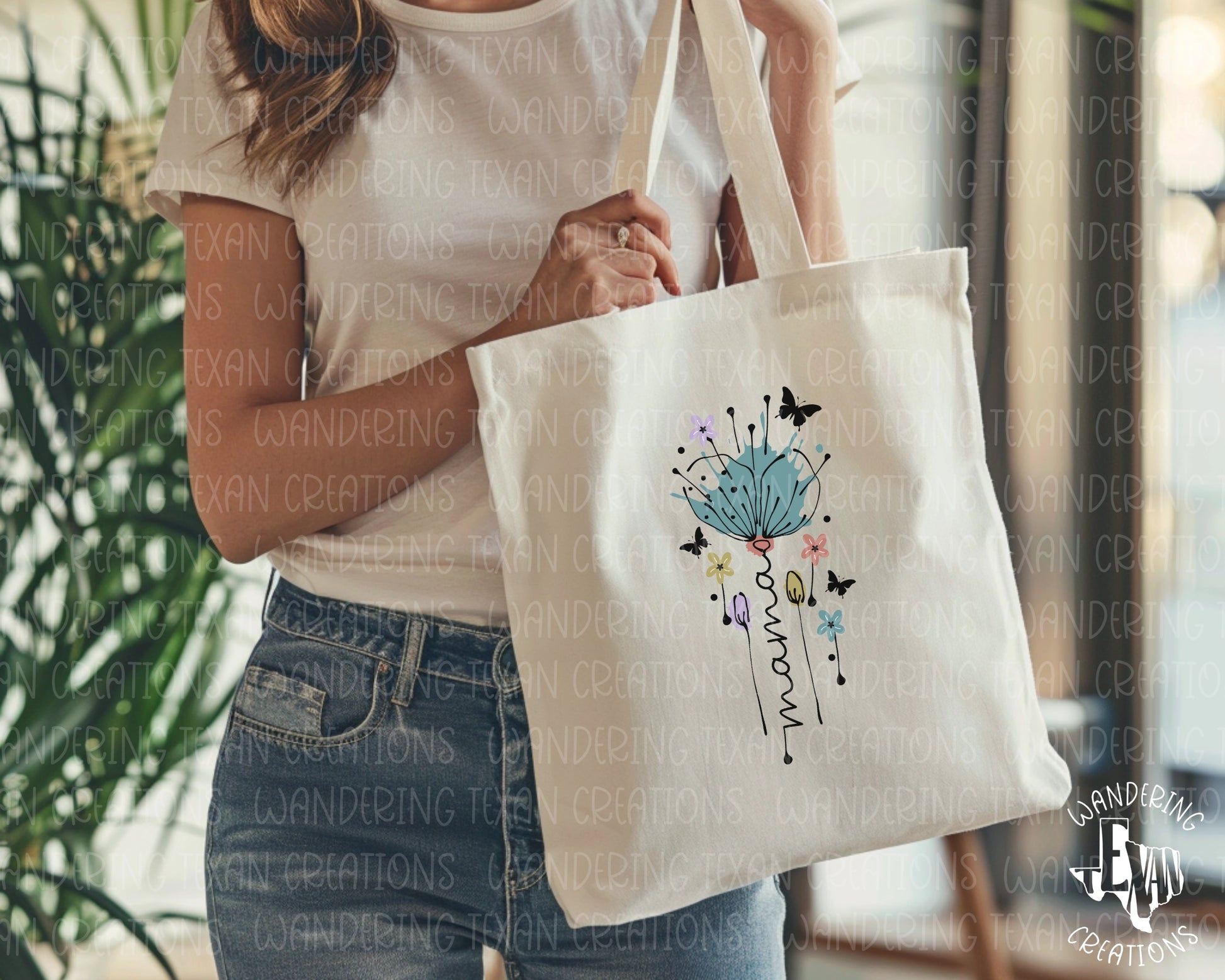 Featuring a vibrant abstract flower design and the word "mama", this bag is perfect for everyday use.