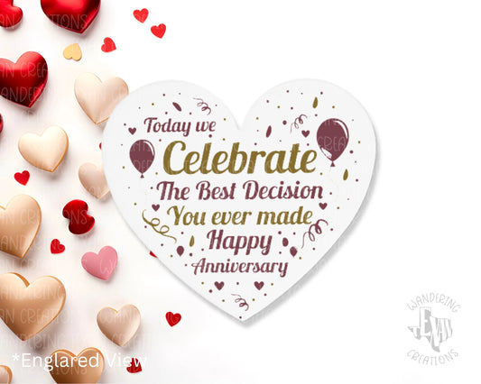 Perfect for anniversaries, this heart-shaped magnet features the inspirational phrase "Today, we celebrate the best decision you ever made."