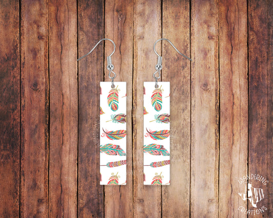 These unique rectangle earrings feature beautifully printed boho feathers, making them the perfect accessory for any outfit.