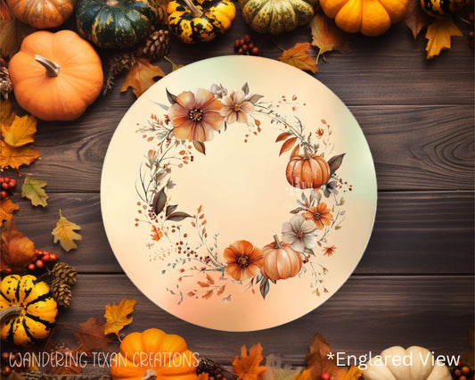 Featuring a round shape and a sublimated design of a watercolor fall background with a wreath of fall florals and pumpkins, this magnet is the perfect seasonal accessory.