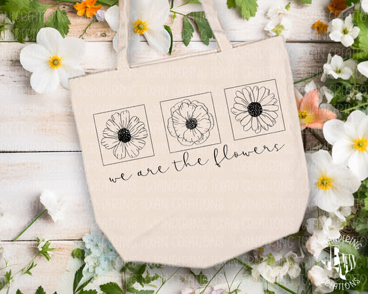 Be a blooming beauty with our Modern Floral Tote Bag! With a simple, modern design and playful phrase, "We are the flowers", this bag is perfect for spring outings.