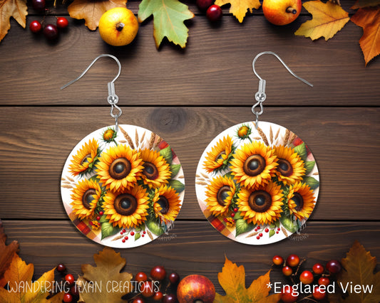 Round-shaped and featuring a sublimated design of a sunflower bouquet with a hint of plaid ribbon, our earrings will bring a seasonal touch to your outfits.