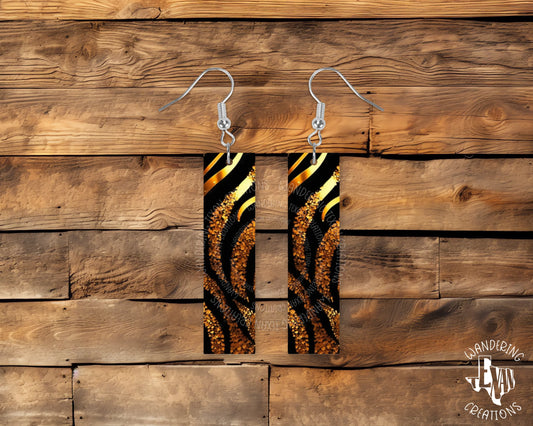 These chic Feisty Leopard Rectangle Earrings combine animal print with glitter for a dramatic effect. 