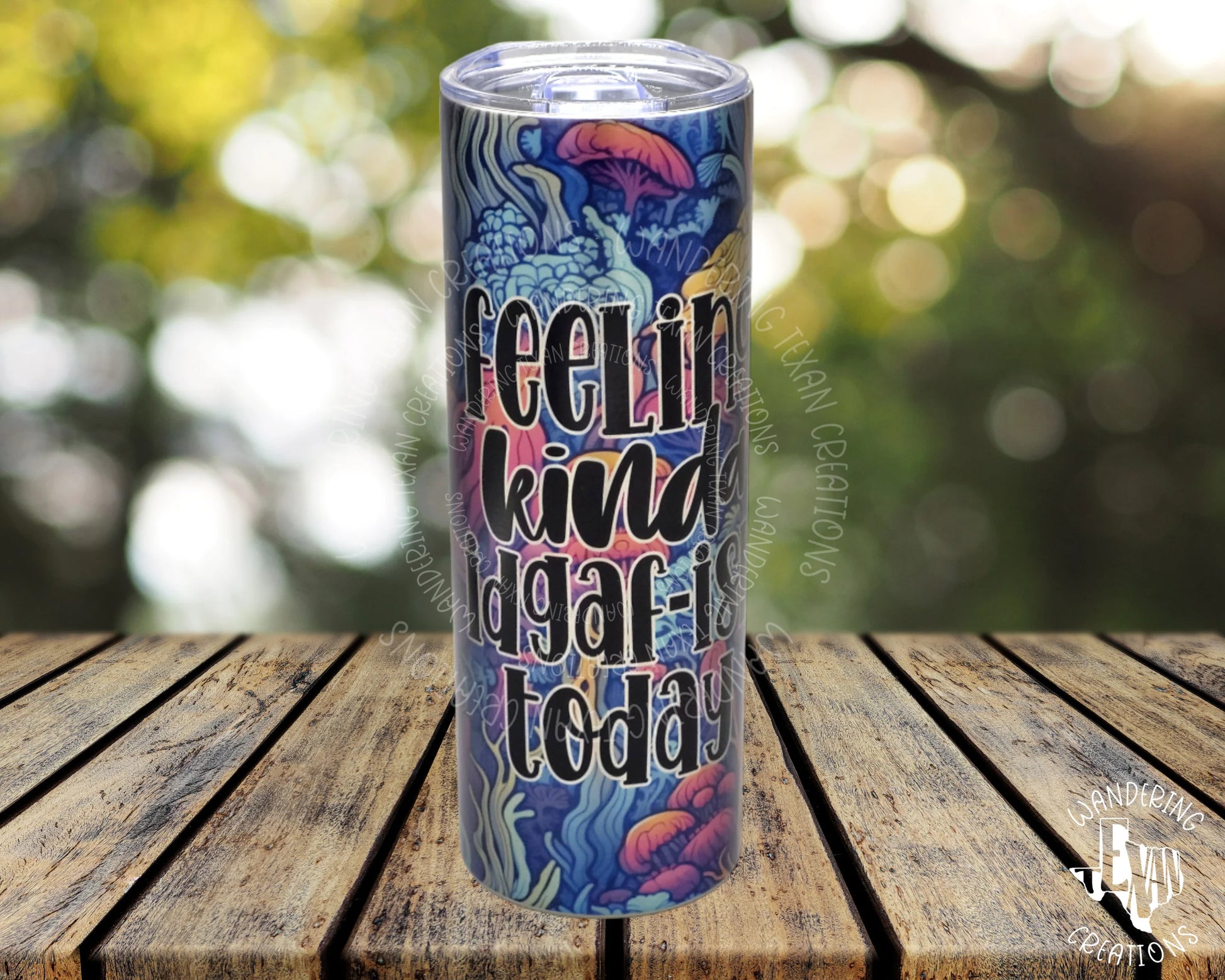 Stay hydrated and show your unique style with the Feeling IDGAF-ish Trippy Trees Tumbler.