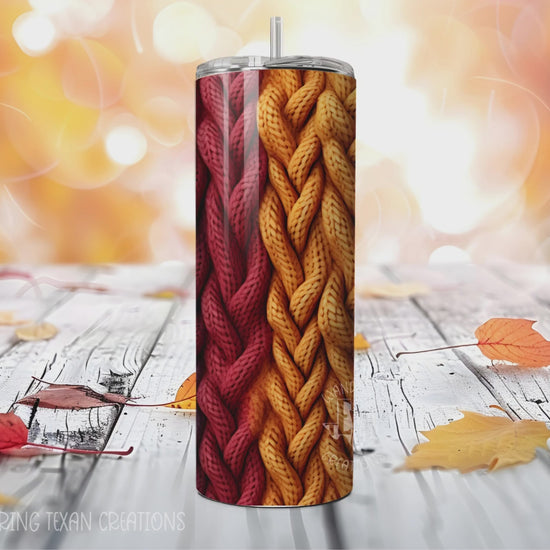 This 20 oz skinny stainless steel tumbler features a unique sublimated design of a knit sweater in warm red, yellow, and blue tones.