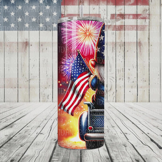 Stay hydrated with this patriotic tumbler featuring a gnome couple watching fireworks from the back of a truck. 