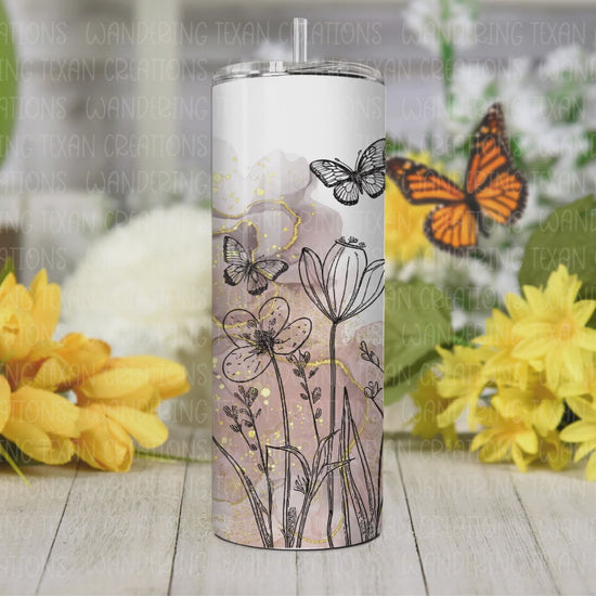 Jazz up your beverage game with our Boho Butterfly Garden Tumbler! With its rose gold and gold background, this tumbler features a boho-style line-drawn flower garden, complete with fluttering butterflies. 