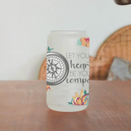 Let your heart guide you on your summer adventures with our Tropical Wanderlust Glass Tumbler. Featuring a sublimation design of a compass and floral pattern, this tumbler will inspire you to follow your heart.