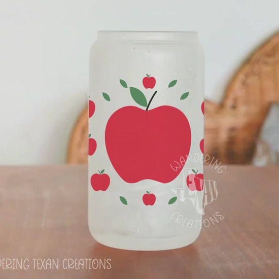 This unique 20 oz tumbler features a sublimation design of a large apple surrounded by smaller apples.