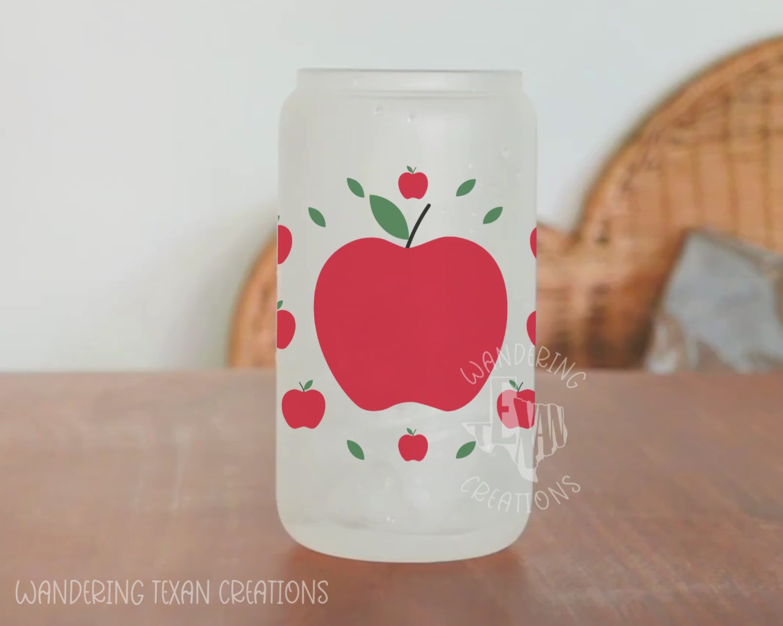 This unique 20 oz tumbler features a sublimation design of a large apple surrounded by smaller apples.