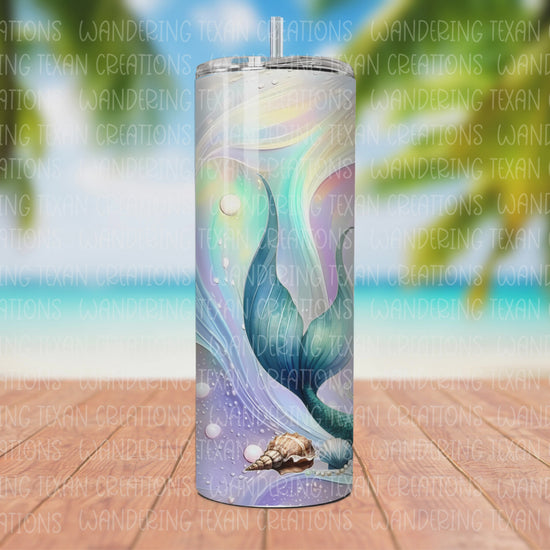 With a stunning sublimation design of a decadently adorned mermaid with pearls, this tumbler is the perfect accessory for your summer adventures.