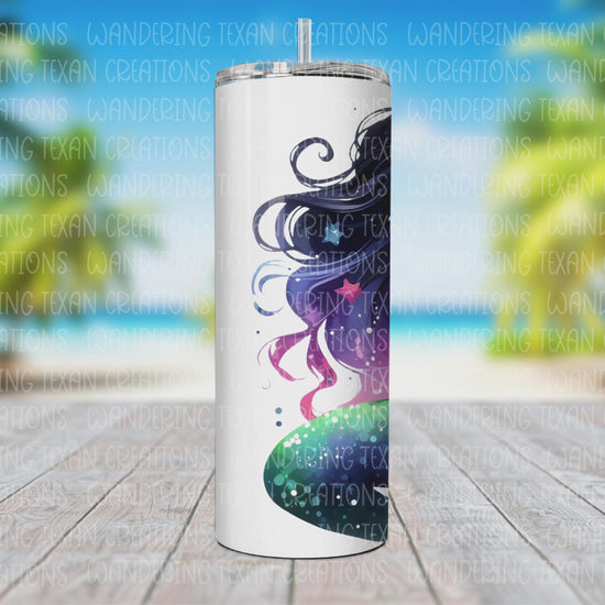 Made with durable stainless steel and a double-wall design, it keeps your drinks cold for hours. The sublimation design of a cosmic mermaid adds a touch of magic to your day.